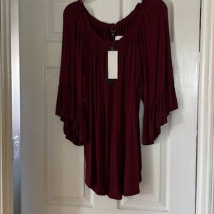 Plum blouse. Off the shoulder or regular.